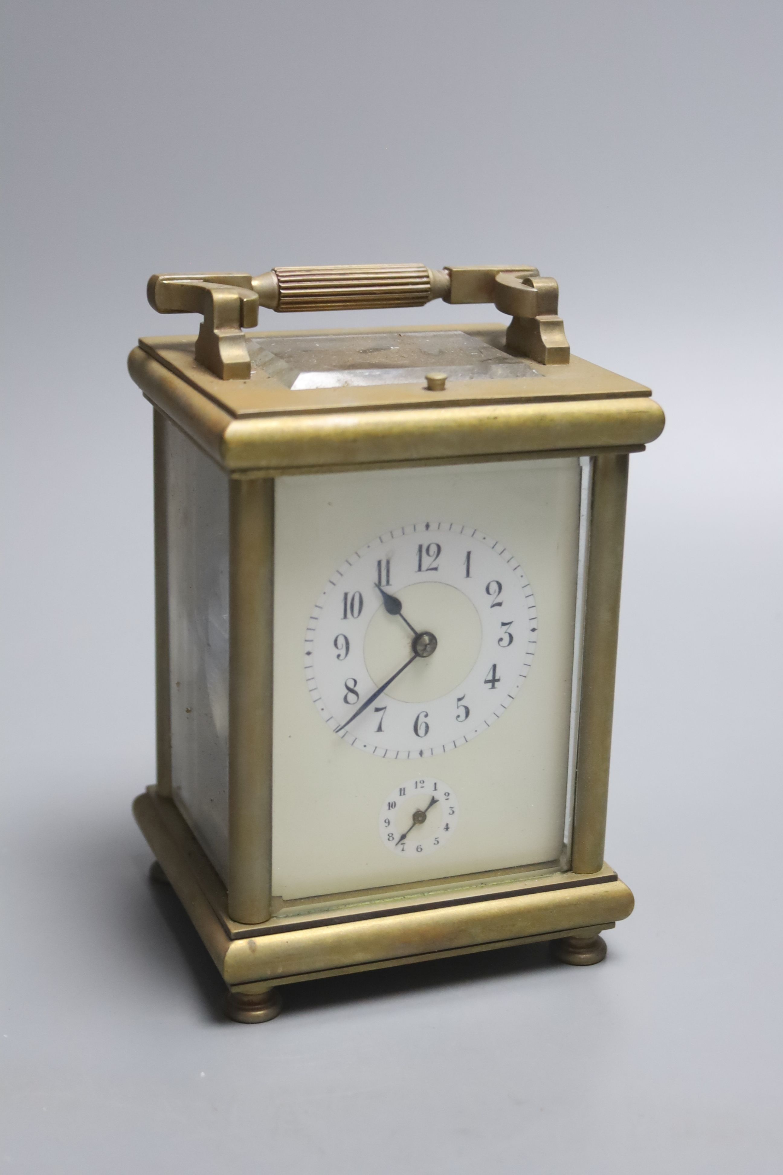 An E. Maurice & Co hour repeating carriage clock, height 16cm with handle down